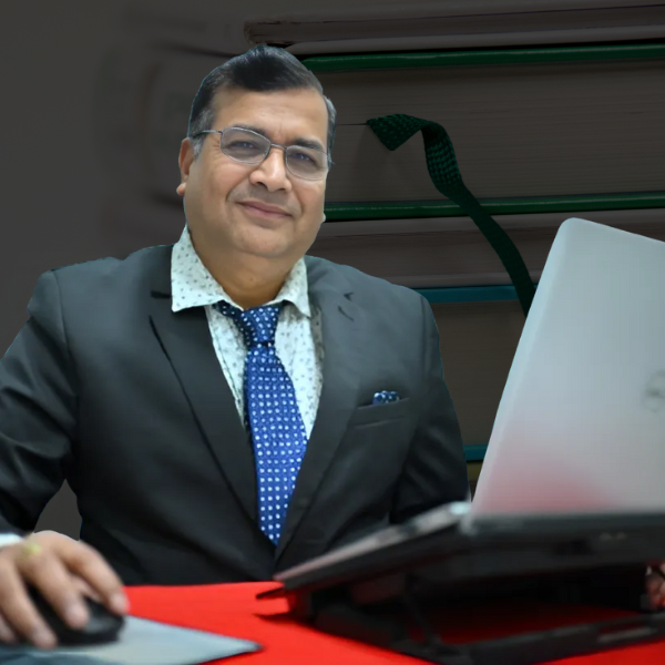 Rajkumar saxena working at office